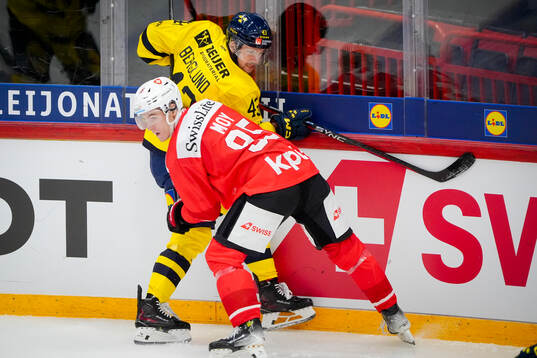 Filip Berglund of Sweden and Tyler Moy of Switzerland