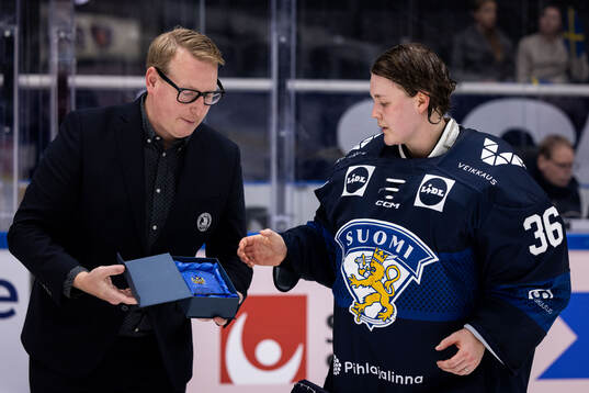 Anni Keisala of Finland is awarded best goaltender