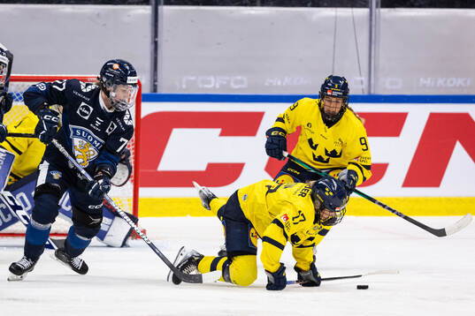 Susanna Tapani of Finland against Sofie Lundin and Emma