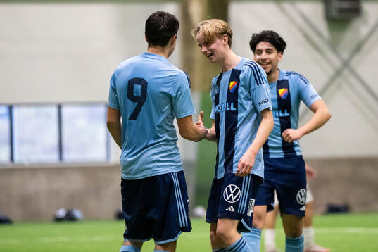 Djurgårdens Mario Amini och Melker Morheden jublar