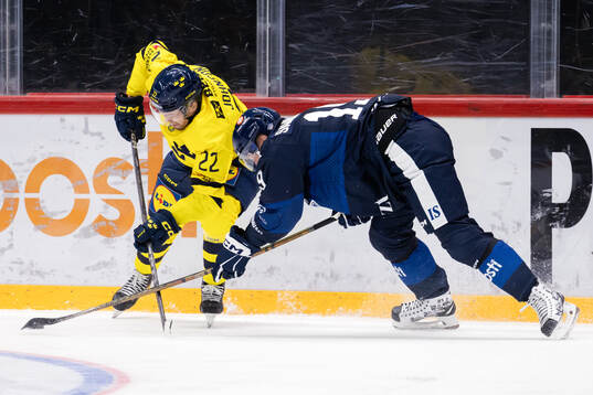Andreas Johnson of Sweden and Veli-Matti Savinainen of