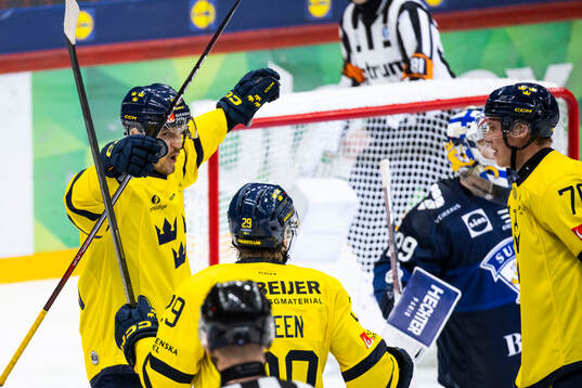 Patrik Karlkvist of Sweden celebrates scoring 4-4