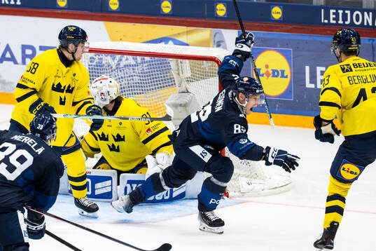 Harri Pesonen of Finland celebrates scoring 4-3
