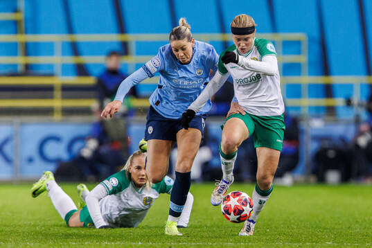 Alanna Kennedy of Manchester City and Julie Blakstad of