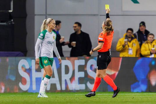Stina Lennartsson of Hammarby is shown a yellow card
