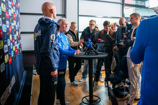 Head coach Ståle Solbakken and doctor Ola Sand of the