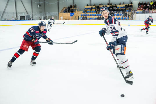 Åsedas Oscar Quist och KRIF s Walter Reimer