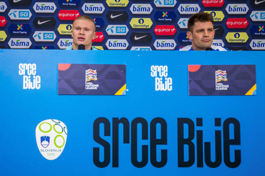 Erling Braut Haaland and press officer Morten Morisbak