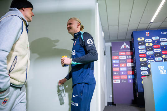 Erling Braut Haaland and Ståle Solbakken, head coach of