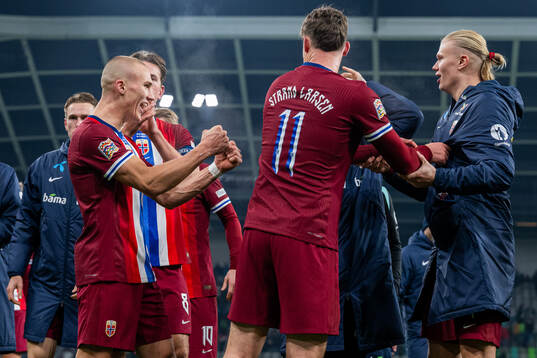 Leo Østigård and Erling Braut Haaland of Norway celebrate