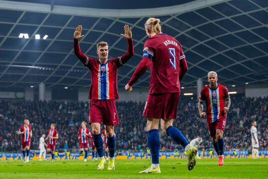 Erling Braut Haaland of Norway celebrates with teammates