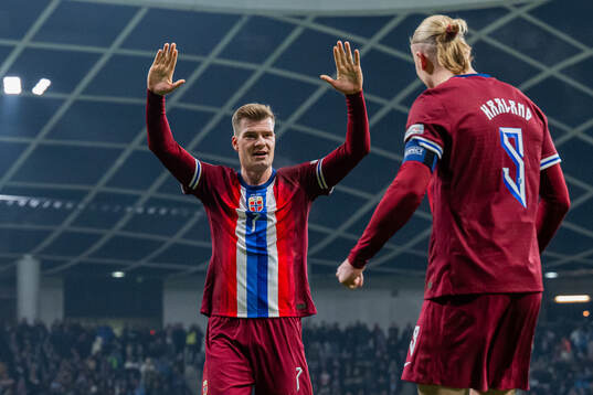 Erling Braut Haaland of Norway celebrates with teammate