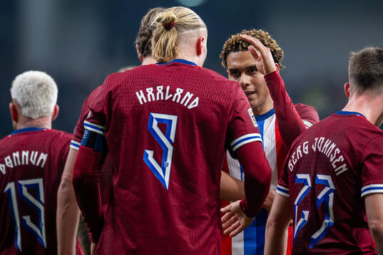 Erling Braut Haaland of Norway celebrates with teammate