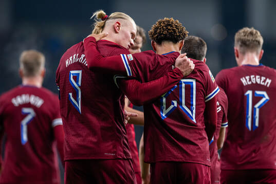 Erling Braut Haaland of Norway celebrates with teammate