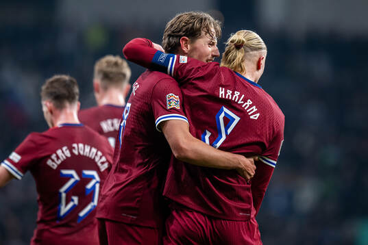 Erling Braut Haaland of Norway celebrates with teammate