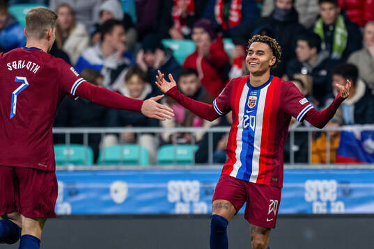 Antonio Nusa of Norway celebrates with teammate Alexander
