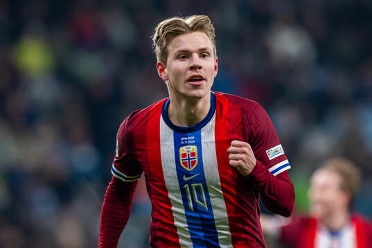 Jens Petter Hauge of Norway celebrates