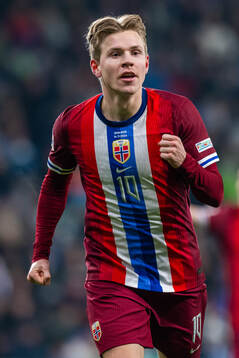Jens Petter Hauge of Norway celebrates