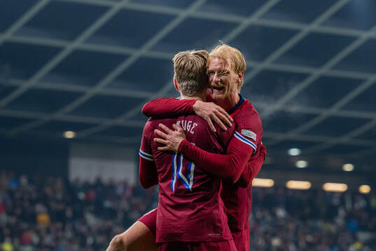 Jens Petter Hauge of Norway celebrates with teammate Morten