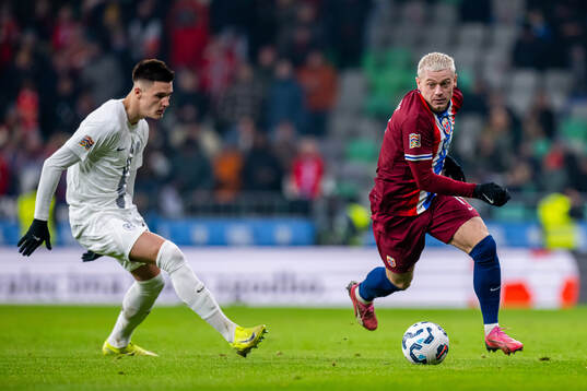 Benjamin Sesko of Slovenia and Julian Ryerson of Norway