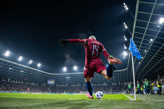 Julian Ryerson of Norway takes a corner kick