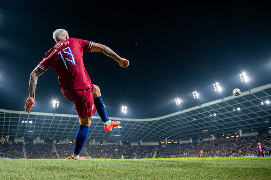Aron Dønnum of Norway takes a corner kick