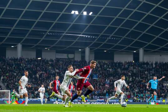 Timi Elsnik of Slovenia and Alexander Sørloth of Norway