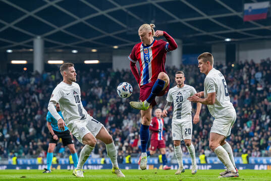 Timi Elsnik of Slovenia, Erling Braut Haaland of Norway and