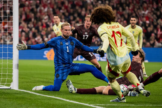 Kasper Schmeichel of Denmark and Marc Cucurella of Spain