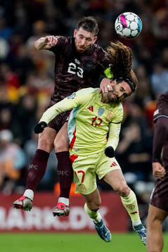 Peter Vindahl of Denmark and Marc Cucurella of Spain