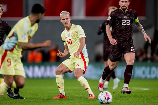 Dani Olmo of Spain and Pierre-Emile Højbjerg of Denmark