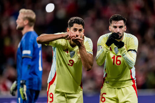 Ayoze Perez and Alex Baena of Spain celebrates