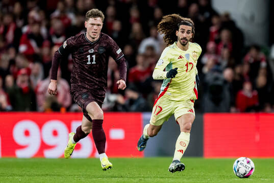 Andreas Skov Olsen of Denmark and Marc Cucurella of Spain