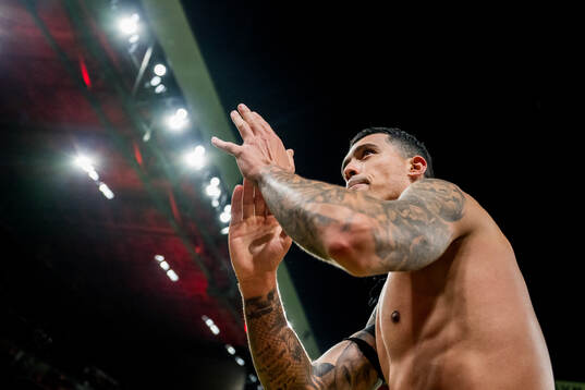 Pedro Porro of Spain celebrates