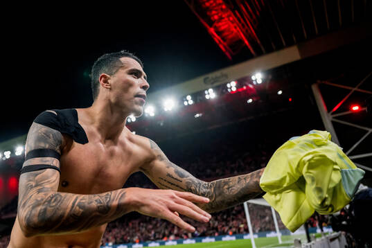 Pedro Porro of Spain celebrates