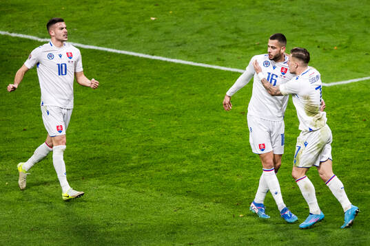 David Hancko and Tomas Suslov of Slovakia celebrate 1-1