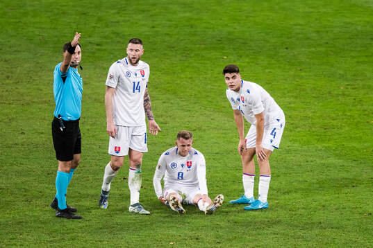 Ondrej Duda of Slovakia in pain