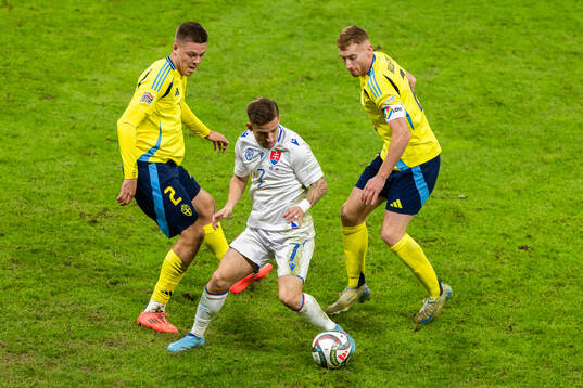 Emil Holm and Dejan Kulusevski of Sweden and Tomas Suslov