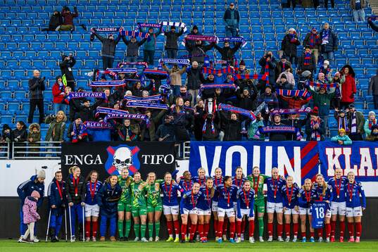 Players of Vålerenga celebrates with the trophy