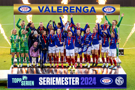 Players of Vålerenga celebrates with the trophy