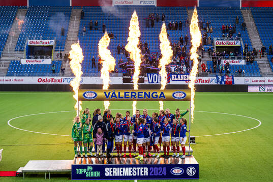 Players of Vålerenga celebrates with the trophy