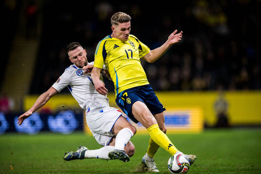 Milan Skriniar of Slovakia and Viktor Gyökeres of Sweden