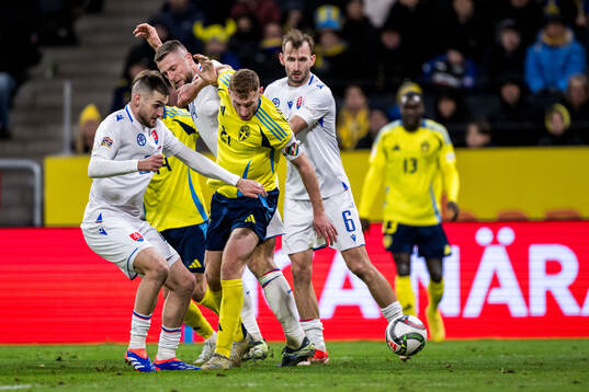 Milan Skriniar and Norbert Gyömber of Slovakia and Dejan