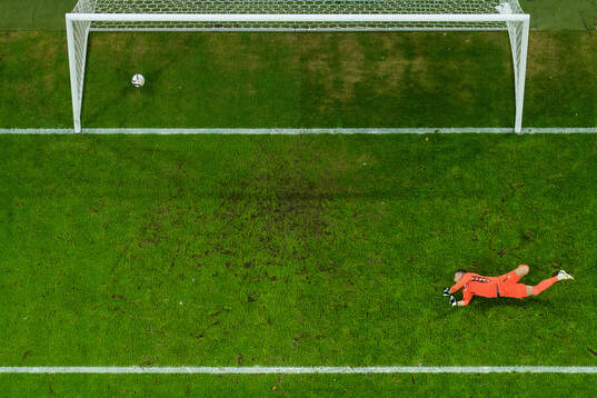 Goalkeeper Martin Dubravka of Slovakia lets in the 1-0 goal