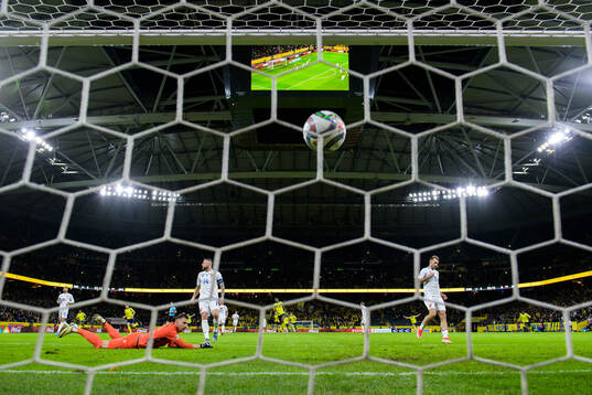 Goalkeeper Martin Dubravka of Slovakia lets in the 1-0 goal
