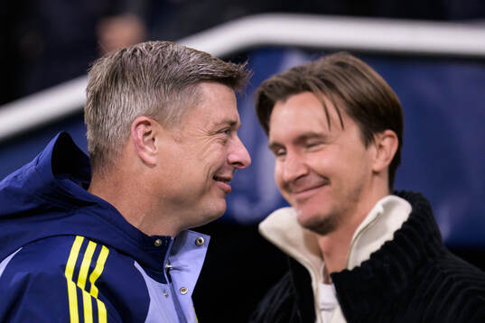 Head coach Jon Dahl Tomasson of Sweden and Kristoffer Olsson