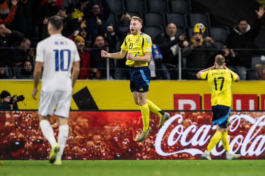 Dejan Kulusevski and Viktor Gyökeres of Sweden celebrating
