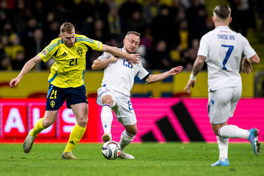 Dejan Kulusevski of Sweden and Stanislav Lobotka of Slovakia