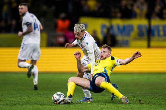 Tomas Rigo of Slovakia and Dejan Kulusevski of Sweden