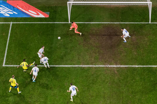Alexander Isak of Sweden scores 2-1